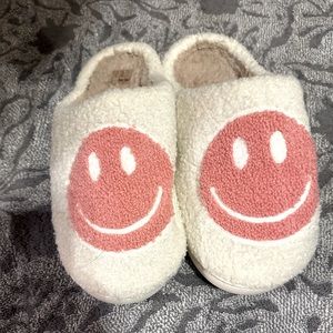 Smiley slippers. Brand new, never worn.